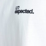 T-shirt Unexpected Basic White un Black